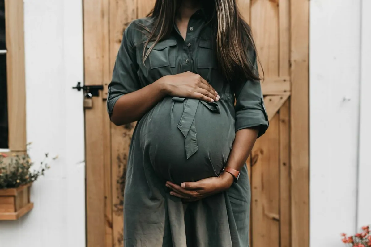 Mother holding her baby with warmth and joy